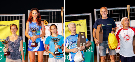 Estate Correndo premiazioni: Lorena Lago al 3° posto assoluto (1^ a sinistra) e Bruno Bettinelli sorridente sul gradino più alto del podio di categoria.